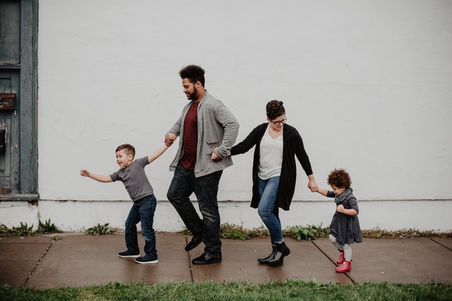 parents walking with children